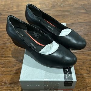Ladies size 9 1/2 Rockport in black with wedge heel.